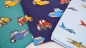 Preview: Kinderjersey planes Flugzeuge Propellermaschine Düsenjäger mit Augen Flugzeug Kinderjersey hellblauer Jerseystoff mit Planes  Kinderjersey Jersey für Kinder Jersey für  Jungs  Baby Jersey  Baumwolljersey