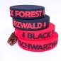 Preview: Schwarzwald Gurtband rot rotes Gurtband mit Schwarzwald Schriftzug Schwarzwald Gurtband Gurtbänder Schwarzwald rot schwarz  40 mm Gurtbänder Schwarzwald rot schwarz schwarz Gurtband Black Forest in 38 mm Taschen Taschengurtband Schwarzwald Black Forest