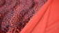 Preview: rotes Leopardenfell Kunstfell in Rot Fellimitat Leopard rot-schwarz Fellimitat - Leopardenfell rot  Fellstoff mit rotem Leopardenmuster LEO